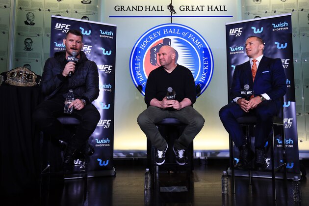 TORONTO, ON - OCTOBER 13: Michael Bisping speaks to the media during the UFC 217 press conference with Dana White and Georges St-Pierre at the Hockey Hall of Fame on October 13, 2017 in Toronto, Canada. (Photo by Vaughn Ridley/Zuffa LLC/Zuffa LLC via Getty Images) TORONTO, ON - OCTOBER 13: Michael Bisping speaks to the media during the UFC 217 press conference with Dana White and Georges St-Pierre at the Hockey Hall of Fame on October 13, 2017 in Toronto, Canada. (Photo by Vaughn Ridley/Zuffa LLC/Zuffa LLC via Getty Images)