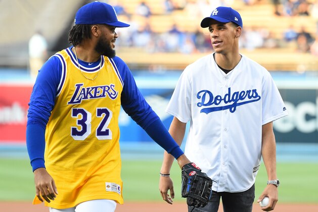 LOS ANGELES, CA - JUNE 23:  Lonzo Ball #2 of the Los Angeles Lakers talks with Kenley Jansen #74 of the Los Angeles Dodgers after throwing out the first pitch before the game against the Colorado Rockies at Dodger Stadium on June 23, 2017 in Los Angeles, California.  (Photo by Jayne Kamin-Oncea/Getty Images)