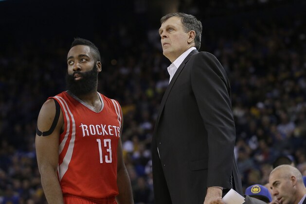 Houston Rockets' James Harden (13) and head coach Kevin McHale talk during an NBA basketball game against the Golden State Warriors in Oakland, Calif., Wednesday, Jan. 21, 2015. (AP Photo/Jeff Chiu)