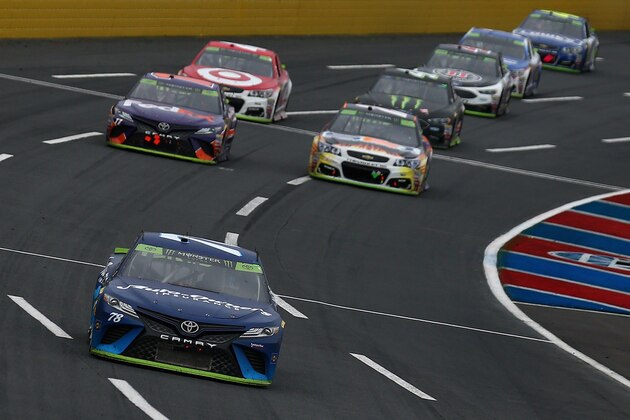 CHARLOTTE, NC - OCTOBER 08:  Martin Truex Jr, driver of the #78 Auto-Owners Insurance Toyota, leads during the Monster Energy NASCAR Cup Series Bank of America 500 at Charlotte Motor Speedway on October 8, 2017 in Charlotte, North Carolina.  (Photo by Sarah Crabill/Getty Images)