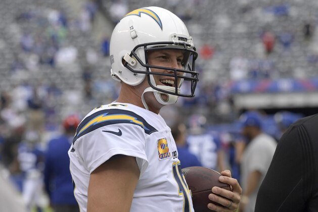 Los Angeles Chargers quarterback Philip Rivers smiles prior to an NFL football game after the game, Sunday, Oct. 8, 2017, in East Rutherford, N.J. (AP Photo/Bill Kostroun)