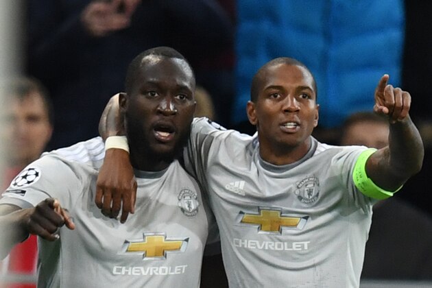 Manchester United's forward from Belgium Romelu Lukaku (L) celebrates with Manchester United's midfielder from England Ashley Young after scoring a goal during the UEFA Champions League Group A football match between PFC CSKA Moscow and Manchester United FC in Moscow on September 27, 2017. / AFP PHOTO / Kirill KUDRYAVTSEV        (Photo credit should read KIRILL KUDRYAVTSEV/AFP/Getty Images)