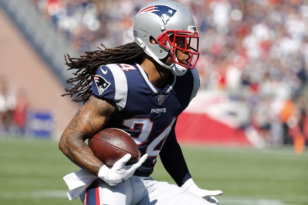 New England Patriots cornerback Stephon Gilmore runs back an interception during an NFL football game against the Houston Texans at Gillette Stadium in Foxborough, Mass. Sunday, Sept. 24, 2017. (Winslow Townson/AP Images for Panini)
