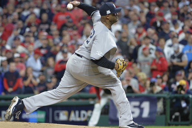 New York Yankees starting pitcher CC Sabathia delivers against the Cleveland Indians during an American League Division Series playoff game, Wednesday, Oct. 11, 2017, in Cleveland. (AP Photo/Phil Long)
