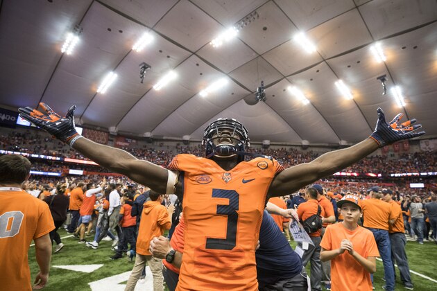 SYRACUSE, NY - OCTOBER 13:  Ervin Philips #3 of the Syracuse Orange celebrates the upset win over Clemson Tigers after fans storm the field at the Carrier Dome on October 13, 2017 in Syracuse, New York. Syracuse defeats Clemson 27-24.  (Photo by Brett Carlsen/Getty Images)