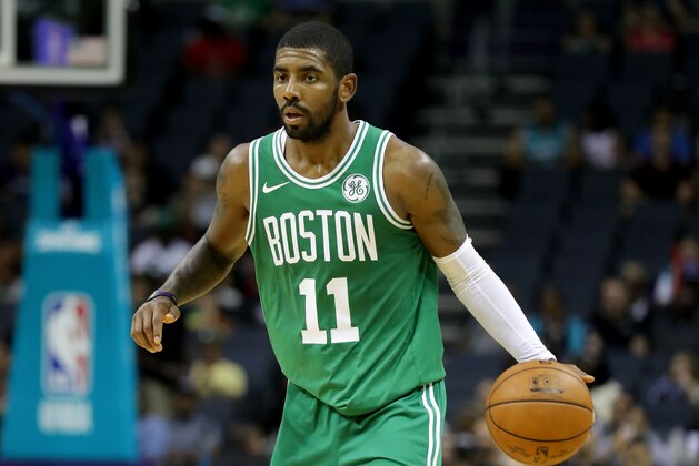 CHARLOTTE, NC - OCTOBER 11:  Kyrie Irving #11 of the Boston Celtics against the Charlotte Hornets during their game at Spectrum Center on October 11, 2017 in Charlotte, North Carolina. NOTE TO USER: User expressly acknowledges and agrees that, by downloading and or using this photograph, User is consenting to the terms and conditions of the Getty Images License Agreement.  (Photo by Streeter Lecka/Getty Images)