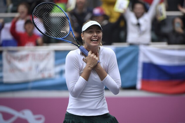 Maria Sharapova of Russia celebrates after winning her women's singles final match against Aryna Sabalenka of Belarus at the Tianjin Open tennis tournament in Tianjin on October 15, 2017. / AFP PHOTO / WANG Zhao        (Photo credit should read WANG ZHAO/AFP/Getty Images)