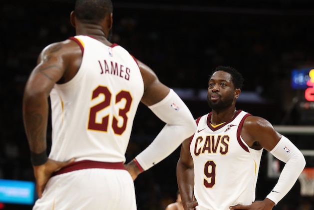 CLEVELAND, OH - OCTOBER 10: Dwyane Wade #9 of the Cleveland Cavaliers talks with LeBron James #23 while playing the Chicago Bulls during a pre season game at Quicken Loans Arena on October 10, 2017 in Cleveland, Ohio. NOTE TO USER: User expressly acknowledges and agrees that, by downloading and or using this photograph, User is consenting to the terms and conditions of the Getty Images License Agreement.  (Photo by Gregory Shamus/Getty Images)