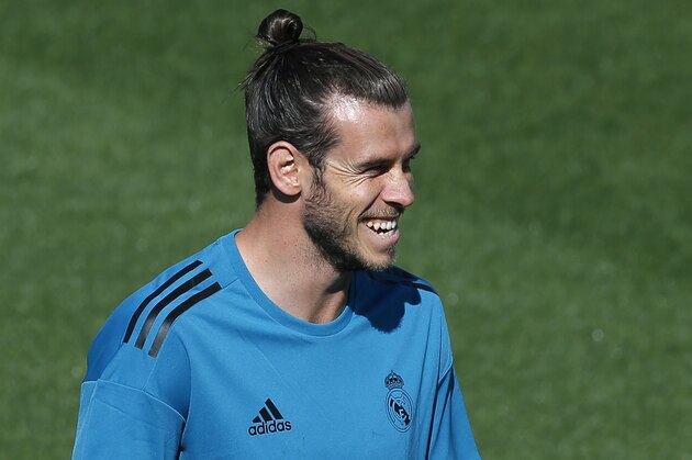 Real Madrid's Gareth Bale smiles during a training session in Madrid, Spain, Tuesday, Sept. 12, 2017. Real Madrid will play APOEL Nikosia Wednesday in a Group H Champions League soccer match. (AP Photo/Paul White)
