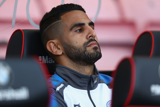 BOURNEMOUTH, ENGLAND - SEPTEMBER 30:  Riyad Mahrez of Leicester City looks on from the substitutes bench during the Premier League match between AFC Bournemouth and Leicester City at Vitality Stadium on September 30, 2017 in Bournemouth, England.  (Photo by Michael Steele/Getty Images)