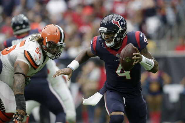 HOUSTON, TX - OCTOBER 15:  Deshaun Watson #4 of the Houston Texans is forced to scramble in the second quarter pressured by Danny Shelton #55 of the Cleveland Browns at NRG Stadium on October 15, 2017 in Houston, Texas.  (Photo by Tim Warner/Getty Images)