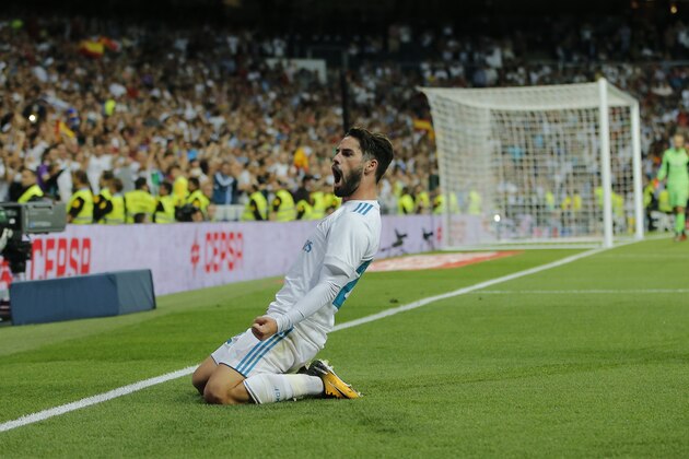 Real Madrid's Isco celebrates after scoring his second goal during a Spanish La Liga soccer match between Real Madrid and Espanyol at the Santiago Bernabeu stadium in Madrid, Spain, Sunday, Oct. 1, 2017. (AP Photo/Paul White)