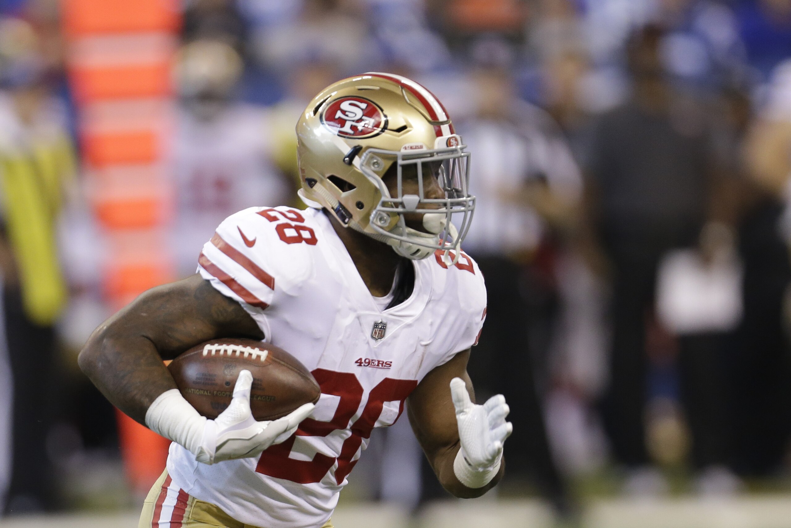 San Francisco 49ers running back Carlos Hyde runs during the first half of an NFL football game against the Indianapolis Colts, Sunday, Oct. 8, 2017, in Indianapolis. (AP Photo/AJ Mast)