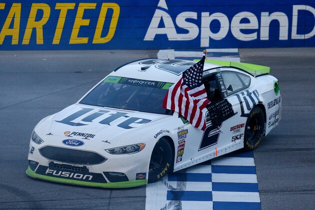 TALLADEGA, AL - OCTOBER 15:  Brad Keselowski, driver of the #2 Miller Lite Ford, celebrates after winning the Monster Energy NASCAR Cup Series Alabama 500 at Talladega Superspeedway on October 15, 2017 in Talladega, Alabama.  (Photo by Sarah Crabill/Getty Images)