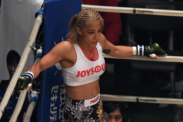 SAITAMA, JAPAN - DECEMBER 31:  Miyuu Yamamoto enters the ring in the bout against Andy Nguyen of the United States during the RIZIN Fighting World GP 2016 final round at Saitama Super Arena on December 31, 2016 in Saitama, Japan.  (Photo by Etsuo Hara/Getty Images)