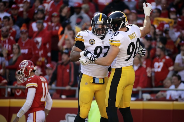 Pittsburgh Steelers linebacker T.J. Watt (90) and defensive end Cameron Heyward (97) celebrate a Chiefs safety when the ball got away from quarterback Alex Smith (11), during the first half of an NFL football game in Kansas City, Mo., Sunday, Oct. 15, 2017. (AP Photo/Charlie Riedel)