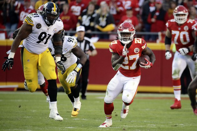 Kansas City Chiefs running back Kareem Hunt (27) carries the ball during the second half of an NFL football game against the Pittsburgh Steelers in Kansas City, Mo., Sunday, Oct. 15, 2017. (AP Photo/Charlie Riedel)