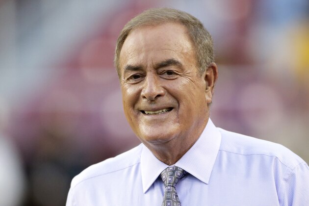 Al Michaels walks onto the field prior to an NFL football game between the Oakland Raiders and Washington Redskins, Sunday, Sept. 24, 2017, in Landover, Md. (AP Photo/Mark Tenally)
