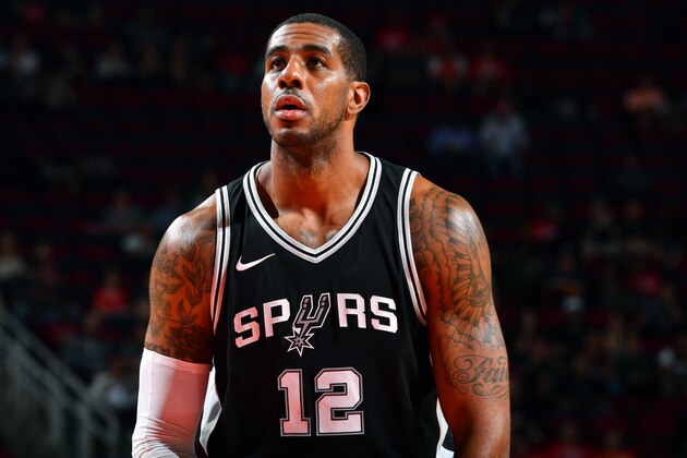HOUSTON, TX - OCTOBER 17: LaMarcus Aldridge #12 of the San Antonio Spurs shoots a free throw during the preseason game against the Houston Rockets on October 13, 2017 at Toyota Center in Houston, Texas. NOTE TO USER: User expressly acknowledges and agrees that, by downloading and/or using this Photograph, user is consenting to the terms and conditions of the Getty Images License Agreement. Mandatory Copyright Notice: Copyright 2017 NBAE (Photo by Jesse D. Garrabrant/NBAE via Getty Images)