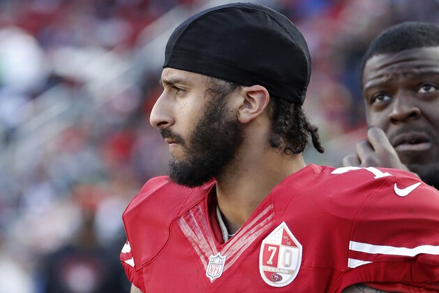 San Francisco 49ers quarterback Colin Kaepernick stands on the sideline during the second half of an NFL football game against the Seattle Seahawks in Santa Clara, Calif., Sunday, Jan. 1, 2017. (AP Photo/Tony Avelar)