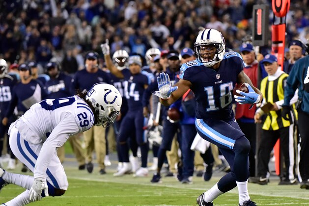 NASHVILLE, TN - OCTOBER 16:  Rishard Matthews #18 of the Tennessee Titans stiff arms Malik Hooker #29 of the Indianapolis Colts during the second half at Nissan Stadium on October 16, 2017 in Nashville, Tennessee.  (Photo by Frederick Breedon/Getty Images)