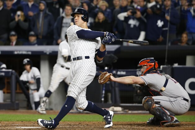 New York Yankees' Aaron Judge hits a three-run home run during the fourth inning of Game 3 of baseball's American League Championship Series against the Houston Astros Monday, Oct. 16, 2017, in New York. (AP Photo/Kathy Willens)