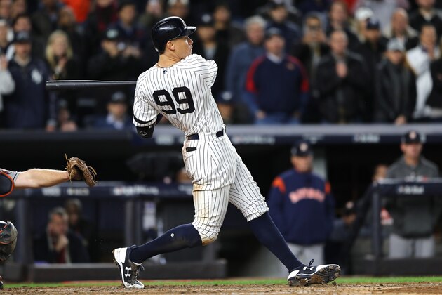 NEW YORK, NY - OCTOBER 16:  Aaron Judge #99 of the New York Yankees hits a 3-run home run during the fourth inning against the Houston Astros in Game Three of the American League Championship Series at Yankee Stadium on October 16, 2017 in the Bronx borough of New York City.  (Photo by Elsa/Getty Images)