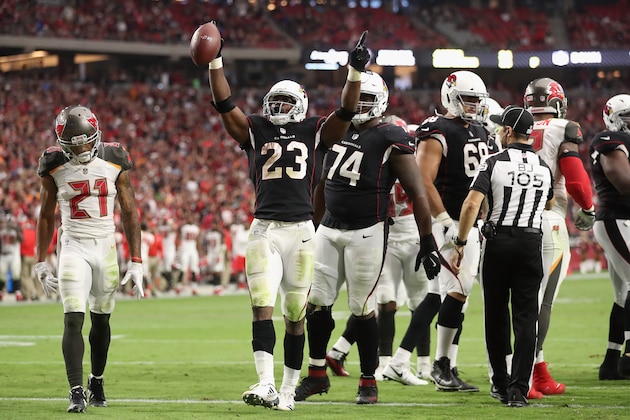 GLENDALE, AZ - OCTOBER 15:  Running back Adrian Peterson #23 of the Arizona Cardinals celebrates after scoring on a one yard rushing touchdown against the Tampa Bay Buccaneers during the second half of the NFL game at the University of Phoenix Stadium on October 15, 2017 in Glendale, Arizona. The Cardinals defeated the  Buccaneers 38-33.  (Photo by Christian Petersen/Getty Images)