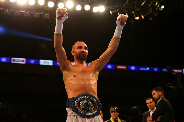 LONDON, ENGLAND - DECEMBER 12:  Paulie Malignaggi (white) celebrates beating Antonio Moscatiello (red) for the Vacant EU Welterweight Championship during the Matchroom Boxing promotion 'Bad Intentions' at The O2 Arena on December 12, 2015 in London, England.  (Photo by Richard Heathcote/Getty Images)