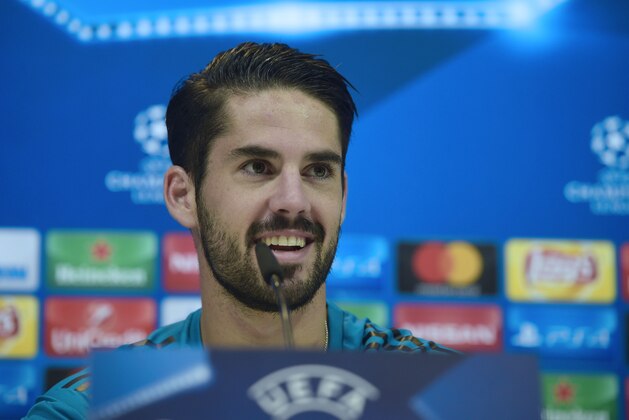 Real Madrid's midfielder Isco gives a press conference after a training session at Valdebebas Sport City in Madrid on October 16, 2017 on the eve of a Champions' League football match against Tottenham. / AFP PHOTO / PIERRE-PHILIPPE MARCOU        (Photo credit should read PIERRE-PHILIPPE MARCOU/AFP/Getty Images)
