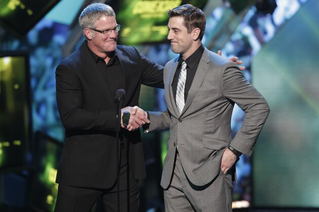 Brett Favre, left, and Aaron Rodgers present at the 2nd Annual NFL Honors on Saturday, Feb. 2, 2013 in New Orleans. (Photo by AJ Mast/Invision/AP)
