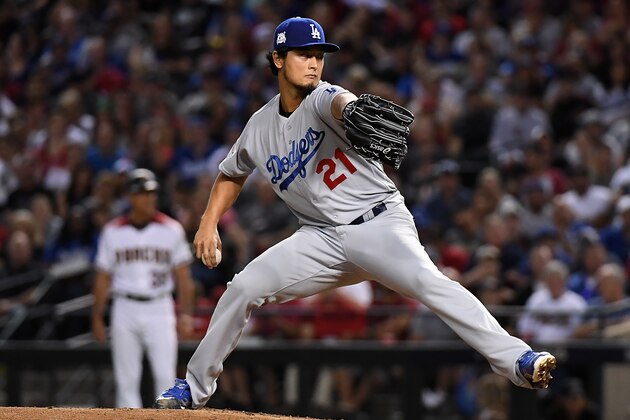 PHOENIX, AZ - OCTOBER 09:  Yu Darvish #21 of the Los Angeles Dodgers delivers a pitch during game three of the National League Divisional Series against the Arizona Diamondbacks at Chase Field on October 9, 2017 in Phoenix, Arizona.  (Photo by Norm Hall/Getty Images)