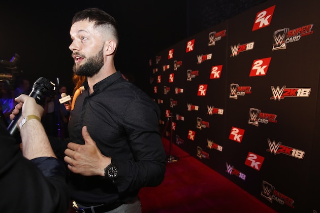 WWE Superstar Finn Bálor is seen at the WWE 2K18 SummerSlam Kickoff Event on Friday, Aug. 18, 2017, in New York. (Photo by Adam Hunger/Invision for 2K Games/AP Images) WWE Superstar Finn Bálor is seen at the WWE 2K18 SummerSlam Kickoff Event on Friday, Aug. 18, 2017, in New York. (Photo by Adam Hunger/Invision for 2K Games/AP Images)