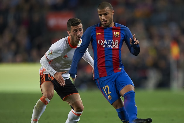 BARCELONA, SPAIN - MARCH 19:  Rafinha  (R) of Barcelona competes for the ball with Jose Luis Gaya of Valencia during the La Liga match between FC Barcelona and Valencia CF at Camp Nou Stadium on March 19, 2017 in Barcelona, Spain.  (Photo by fotopress/Getty Images)