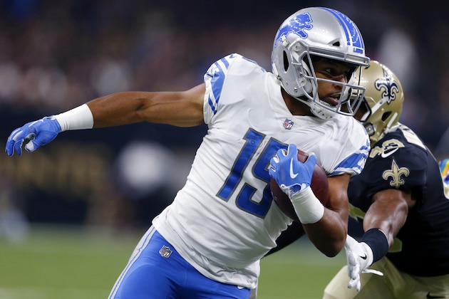 Detroit Lions wide receiver Golden Tate (15) carries for a touchdown past New Orleans Saints free safety Marcus Williams in the first half of an NFL football game in New Orleans, Sunday, Oct. 15, 2017. (AP Photo/Butch Dill)