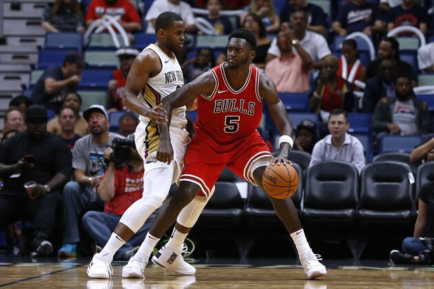 NEW ORLEANS, LA - OCTOBER 03: Bobby Portis #5 of the Chicago Bulls drives against Darius Miller #21 of the New Orleans Pelicans during a preseason game at the Smoothie King Center on October 3, 2017 in New Orleans, Louisiana. NOTE TO USER: User expressly acknowledges and agrees that, by downloading and or using this Photograph, user is consenting to the terms and conditions of the Getty Images License Agreement. (Photo by Jonathan Bachman/Getty Images)