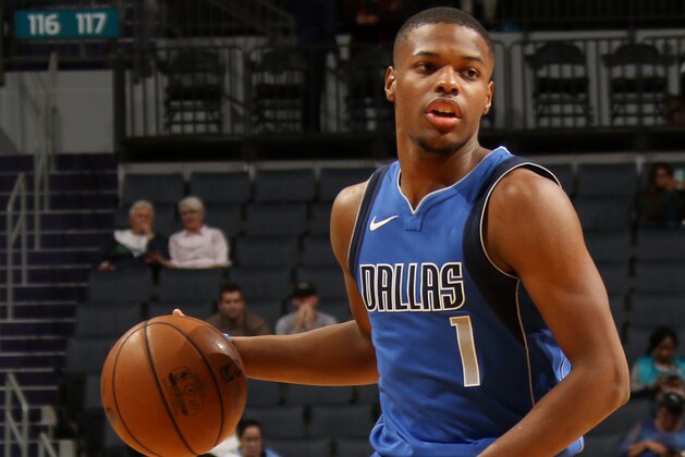 CHARLOTTE, NC - OCTOBER 13:  Dennis Smith Jr. #1 of the Dallas Mavericks handles the ball against the Charlotte Hornets on October 13, 2017 at Spectrum Center in Charlotte, North Carolina. NOTE TO USER: User expressly acknowledges and agrees that, by downloading and or using this photograph, User is consenting to the terms and conditions of the Getty Images License Agreement.  Mandatory Copyright Notice:  Copyright 2017 NBAE (Photo by Brock Williams-Smith/NBAE via Getty Images)