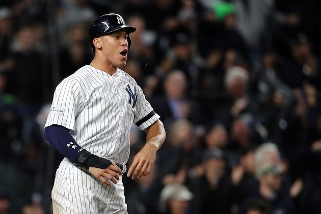 NEW YORK, NEW YORK - OCTOBER 17: Aaron Judge #99 of the New York Yankees reacts after scoring in the eighth inning against the Houston Astros during Game Four of the American League Championship Series at Yankee Stadium on October 17, 2017 in the Bronx borough of New York City. (Photo by Elsa/Getty Images)