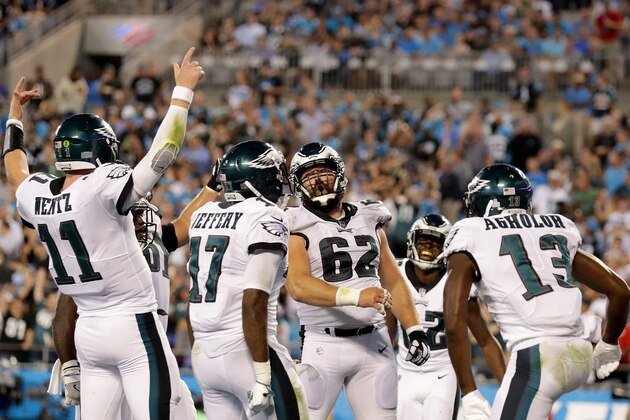 CHARLOTTE, NC - OCTOBER 12:  Carson Wentz #11 celebrates with teammates after a fourth quarter touchdown against the Carolina Panthers during their game at Bank of America Stadium on October 12, 2017 in Charlotte, North Carolina.  (Photo by Streeter Lecka/Getty Images)