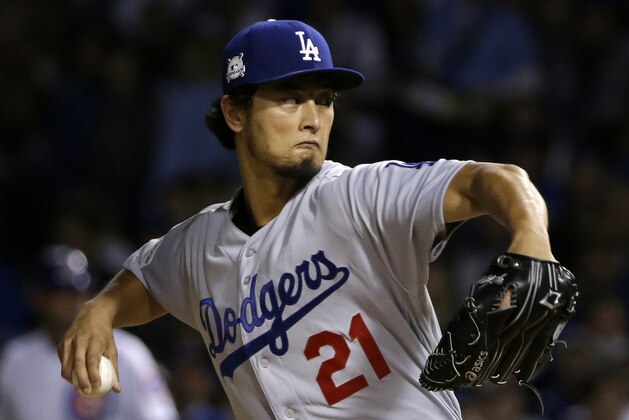 Los Angeles Dodgers starting pitcher Yu Darvish (21) throws during the first inning of Game 3 of baseball's National League Championship Series against the Chicago Cubs, Tuesday, Oct. 17, 2017, in Chicago. (AP Photo/Nam Y. Huh)