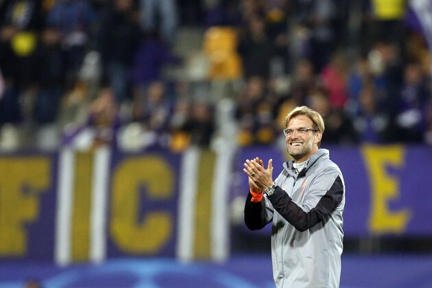Liverpool coach Jurgen Klopp celebrates at the end of the Champions League soccer match between Maribor and Liverpool at the Ljudski vrt stadium, in Maribor, Slovenia, Tuesday, Oct. 17, 2017. (AP Photo/Darko Bandic)
