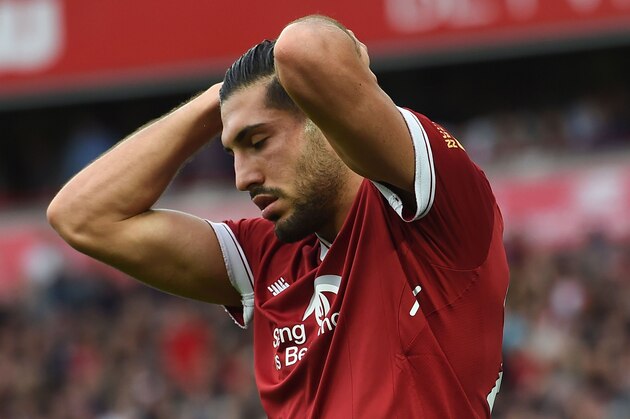 Liverpool's German midfielder Emre Can reacts to a missed chance during the English Premier League football match between Liverpool and Manchester United at Anfield in Liverpool, north west England on October 14, 2017.
The game ended 0-0. / AFP PHOTO / Paul ELLIS / RESTRICTED TO EDITORIAL USE. No use with unauthorized audio, video, data, fixture lists, club/league logos or 'live' services. Online in-match use limited to 75 images, no video emulation. No use in betting, games or single club/league/player publications.  /         (Photo credit should read PAUL ELLIS/AFP/Getty Images)