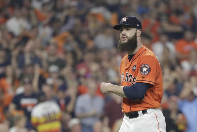 Houston Astros starting pitcher Dallas Keuchel reacts after striking out New York Yankees' Aaron Judge during the third inning of Game 1 of baseball's American League Championship Series Friday, Oct. 13, 2017, in Houston. (AP Photo/David J. Phillip)