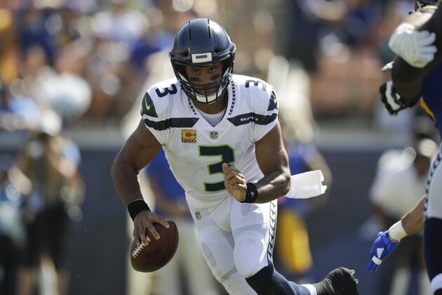 Seattle Seahawks quarterback Russell Wilson carries the ball during an NFL football game against the Los Angeles Rams Sunday, Oct. 8, 2017, in Los Angeles. (AP Photo/Jae C. Hong)