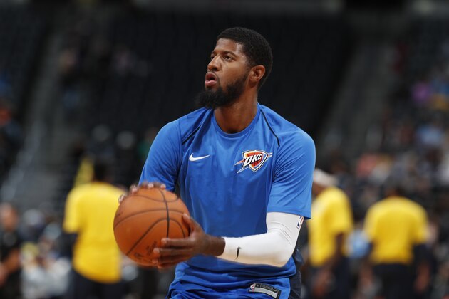 Oklahoma City Thunder forward Paul George (13) in the first half of an NBA preseason basketball game Tuesday, Oct. 10, 2017, in Denver. (AP Photo/David Zalubowski)