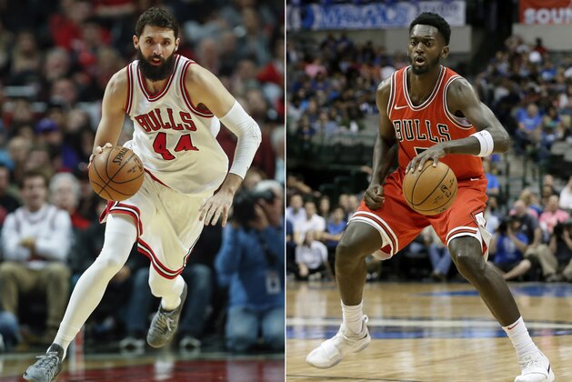 FILe - At left, in a Jan. 2, 2017, file photo, Chicago Bulls forward Nikola Mirotic brings the ball up court against the Charlotte Hornets during the second half of an NBA basketball game in Chicago. At right, in an Oct. 4, 2017, file photo, Chicago Bulls' Bobby Portis (5) handles the ball during a preseason NBA basketball game against the Dallas Mavericks, in Dallas. The Chicago Bulls have suspended forward Bobby Portis for the first eight games for injuring teammate Nikola Mirotic during a fight at practice. Mirotic suffered multiple broken bones in his face as well as a concussion on Tuesday. He will likely need surgery and is out indefinitely. The team announced the suspension on Wednesday, Oct. 18, 2017. (AP Photo/Tony Gutierrez)