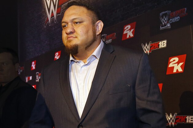 WWE Superstar Samoa Joe is seen at the WWE 2K18 SummerSlam Kickoff Event on Friday, Aug. 18, 2017, in New York. (Photo by Adam Hunger/Invision for 2K Games/AP Images)