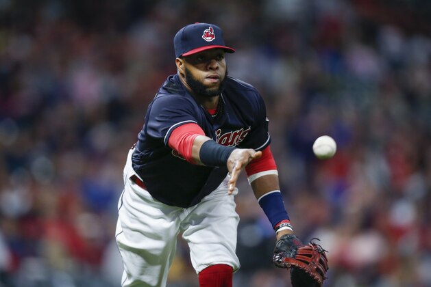 CLEVELAND, OH - SEPTEMBER 30: Carlos Santana #41 of the Cleveland Indians throws out Adam Engel #41 of the Chicago White Sox at first base during the seventh inning at Progressive Field on September 30, 2017 in Cleveland, Ohio. The White Sox defeated the Indians 2-1. (Photo by Ron Schwane/Getty Images)