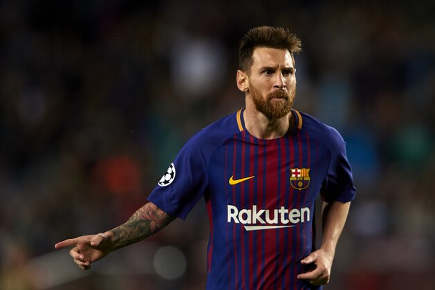 BARCELONA, SPAIN - OCTOBER 18:  Lionel Messi of Barcelona celebrates scoring his team's second goal during the UEFA Champions League group D match between FC Barcelona and Olympiakos Piraeus at Camp Nou on October 18, 2017 in Barcelona, Spain.  (Photo by Manuel Queimadelos Alonso/Getty Images)