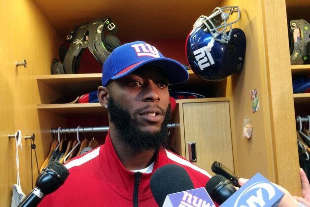 New York Giants cornerback Dominique Rodgers-Cromartie speaks with reporters in the locker room at the NFL football team's training facility, Wednesday, Oct. 18, 2017, in East Rutherford, N.J. (AP Photo/Tom Canavan)